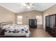 Spacious bedroom with tile floors and ceiling fan at 745 E Megan St, Chandler, AZ 85225