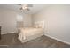 Cozy bedroom with carpeted floor and ceiling fan at 10773 W Swayback W Pass, Peoria, AZ 85383