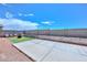 Spacious backyard with a firepit and artificial turf at 10773 W Swayback W Pass, Peoria, AZ 85383