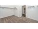 Bright walk-in closet with access to bathroom at 10773 W Swayback W Pass, Peoria, AZ 85383