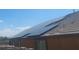 Home with solar panels installed on roof at 10773 W Swayback W Pass, Peoria, AZ 85383
