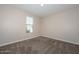 Bright bedroom featuring a window and neutral walls at 10773 W Swayback W Pass, Peoria, AZ 85383