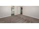 Simple bedroom with carpeted floors and neutral walls at 10773 W Swayback W Pass, Peoria, AZ 85383