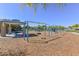 Playground with covered seating area and play equipment at 10773 W Swayback W Pass, Peoria, AZ 85383