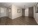 Elegant hallway with hardwood floors and neutral walls at 10773 W Swayback W Pass, Peoria, AZ 85383