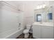Clean bathroom with a bathtub, toilet and vanity at 10773 W Swayback W Pass, Peoria, AZ 85383