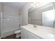 Clean bathroom with white vanity and bathtub at 10773 W Swayback W Pass, Peoria, AZ 85383