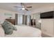 King bedroom with mirrored closet doors and large windows at 3500 N Hayden Rd # 1005, Scottsdale, AZ 85251