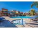 Community pool and spa with lounge chairs; perfect for relaxation at 3500 N Hayden Rd # 1005, Scottsdale, AZ 85251