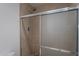 Shower stall with glass enclosure and neutral tile at 3500 N Hayden Rd # 1005, Scottsdale, AZ 85251
