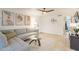 Living room with L-shaped sofa and access to patio at 3500 N Hayden Rd # 1005, Scottsdale, AZ 85251