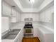 Clean and bright kitchen with white cabinets at 4730 W Northern Ave # 3067, Glendale, AZ 85301