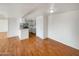 Open living area with wood flooring and neutral walls, offering a spacious feel at 4730 W Northern Ave # 3067, Glendale, AZ 85301