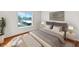 Main bedroom with wood floors and large window offering natural light at 4730 W Northern Ave # 3067, Glendale, AZ 85301