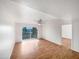 Spacious living room with wood flooring and access to balcony at 4730 W Northern Ave # 3067, Glendale, AZ 85301