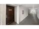 Building hallway with unit door at 4730 W Northern Ave # 3067, Glendale, AZ 85301