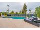 Relaxing pool area with lounge chairs and landscaping at 8608 E Angus Dr, Scottsdale, AZ 85251