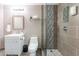 Bathroom with walk-in shower and modern vanity at 8608 E Angus Dr, Scottsdale, AZ 85251