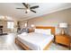 Bedroom with a queen bed and built-in sitting area at 8608 E Angus Dr, Scottsdale, AZ 85251