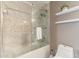 Bathroom with herringbone tile and a large walk-in shower at 8608 E Angus Dr, Scottsdale, AZ 85251