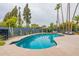 This curved pool is perfect for a relaxing afternoon at 8608 E Angus Dr, Scottsdale, AZ 85251