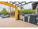 Outdoor kitchen with grill and refrigerator at 8608 E Angus Dr, Scottsdale, AZ 85251
