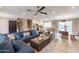 Spacious living room with an open floor plan and views to the kitchen and pool at 8608 E Angus Dr, Scottsdale, AZ 85251