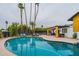 Relax by the large kidney shaped pool with plenty of space for sunbathing at 8608 E Angus Dr, Scottsdale, AZ 85251