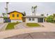 Mid-century modern home with landscaped yard at 8608 E Angus Dr, Scottsdale, AZ 85251