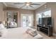 Comfortable bedroom with a queen-size bed and a TV at 8608 E Angus Dr, Scottsdale, AZ 85251