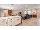 Modern kitchen with white shaker cabinets, quartz countertops, and stainless steel appliances at 8608 E Angus Dr, Scottsdale, AZ 85251