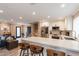 Modern kitchen with white shaker cabinets, quartz countertops, and stainless steel appliances at 8608 E Angus Dr, Scottsdale, AZ 85251