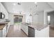 Modern kitchen with granite countertops and island at 21451 W Palm Ln, Buckeye, AZ 85396