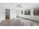 Spacious living area with hardwood floors and natural light at 21451 W Palm Ln, Buckeye, AZ 85396