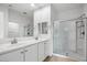 Bathroom boasts double sinks and a large walk-in shower at 21451 W Palm Ln, Buckeye, AZ 85396