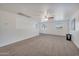 Bright loft with carpet flooring and multiple windows at 2343 E Meadow Land Dr, San Tan Valley, AZ 85140