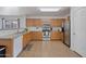 Spacious kitchen with wood cabinets and granite counters at 2343 E Meadow Land Dr, San Tan Valley, AZ 85140