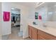 Bathroom boasts dual sinks and a walk-in closet at 2343 E Meadow Land Dr, San Tan Valley, AZ 85140