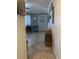 Bright hallway with tile flooring, offering views into living areas at 303 N 7Th St, Avondale, AZ 85323