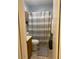 Clean bathroom with shower/tub combo and wood vanity at 303 N 7Th St, Avondale, AZ 85323