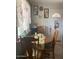 Bright dining area with a wooden table and four chairs at 303 N 7Th St, Avondale, AZ 85323