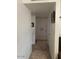Hallway with doors to bedrooms and other rooms at 303 N 7Th St, Avondale, AZ 85323