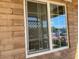 Double-hung window with gridded glass panes at 303 N 7Th St, Avondale, AZ 85323