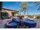 Community courtyard with a blue tiled fountain at 90 E Leverenz Ave, Queen Creek, AZ 85140