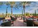 Outdoor seating area with a view of a golf course at 90 E Leverenz Ave, Queen Creek, AZ 85140