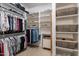 Well-organized walk-in closet with shelves and drawers at 90 E Leverenz Ave, Queen Creek, AZ 85140