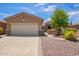 Charming single-story home with a two-car garage at 20980 N Sweet Dreams Dr, Maricopa, AZ 85138
