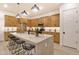Modern kitchen with island and stainless steel appliances at 22511 E Saddle Ct, Queen Creek, AZ 85142