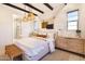Bright bedroom with a neutral color palette and en-suite bathroom at 22511 E Saddle Ct, Queen Creek, AZ 85142