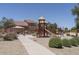 Community playground with play structure and shaded seating at 1720 W Coolidge Way, Coolidge, AZ 85128